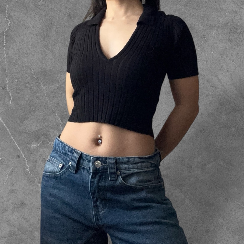 Black polo-style short-sleeved top